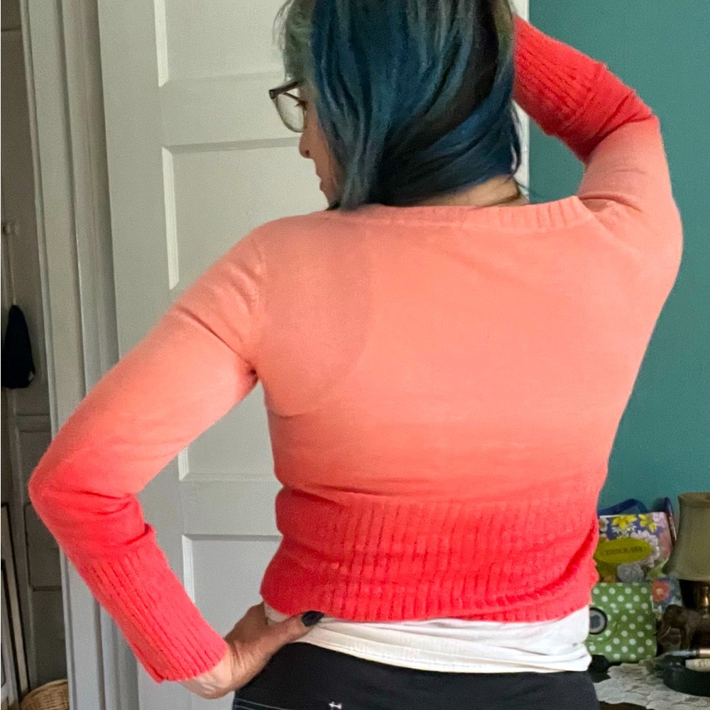 Fun lightweight ombré sweater. Sexy fit, open scoop neck.